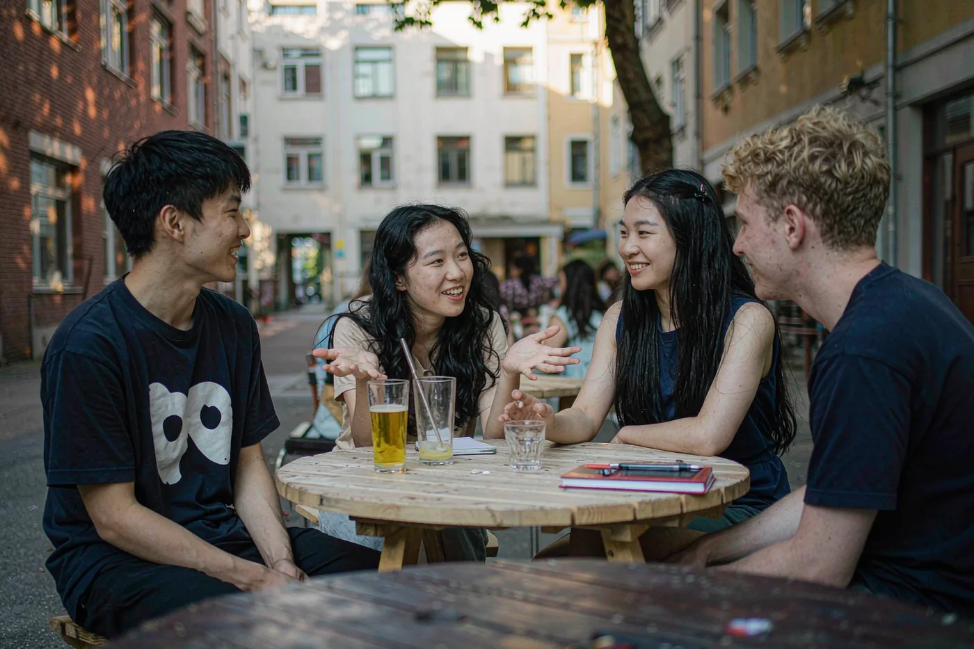 International and Chinese students chatting together on a Chinese university campus