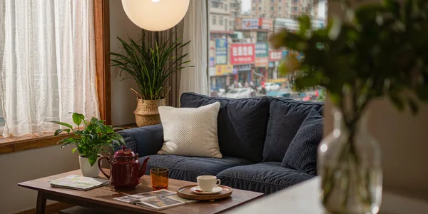Cozy modern apartment interior in a Chinese city with tea and city view